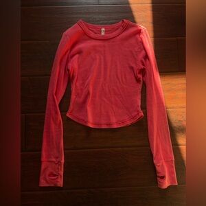 FP Movement Ribbed Long Sleeve Baby Tee in Coral